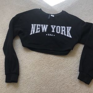 Black cropped New York sweater
